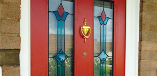 A closed red front door