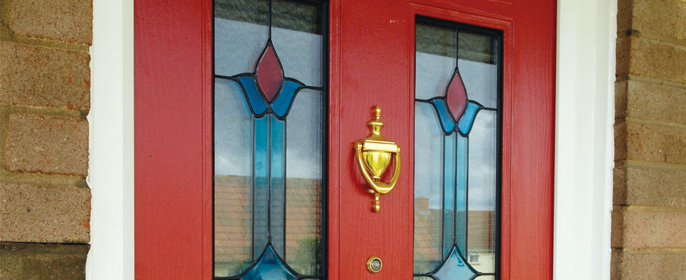 A closed red front door