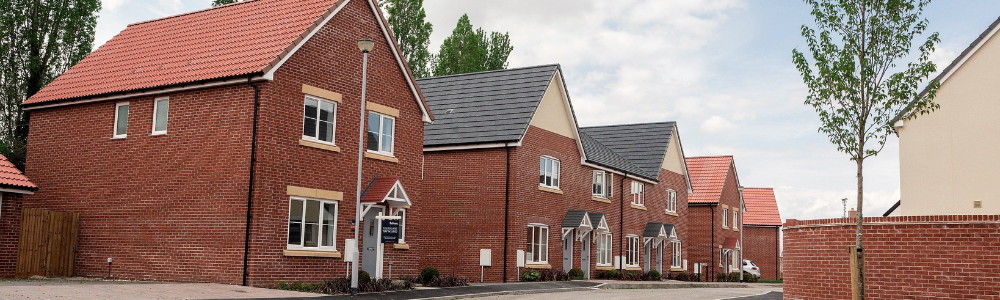 Red brick homes on a new development scheme.